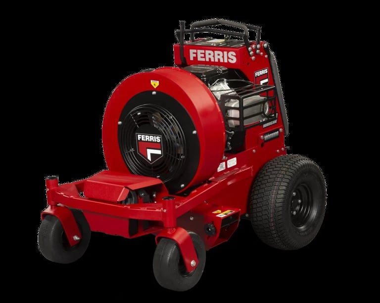 Red Ferris commercial lawn mower with large rear wheels and engine mounted on front against black background