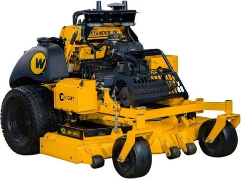 Yellow and black zero-turn radius riding lawn mower with front-mounted cutting deck against white background