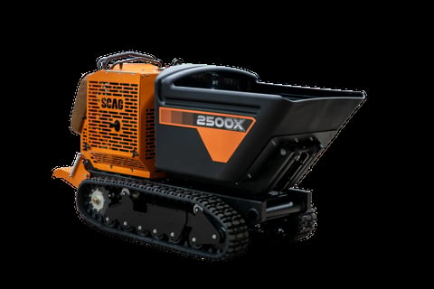 Orange and black SCAG 2500X tracked dumper with heated cab, isolated on white background